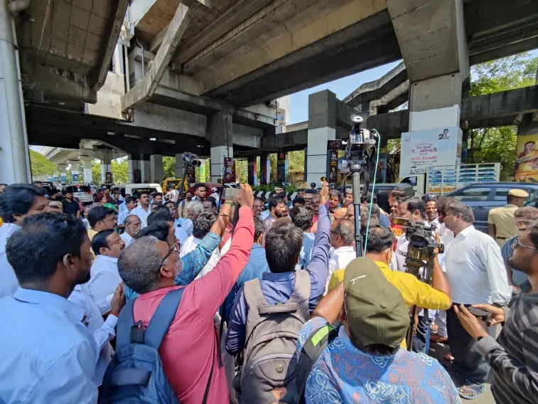 Commuters outside a Chennai metro station